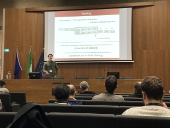 Kenan Wood presents a paper at an international conference in Lucca, Italy.