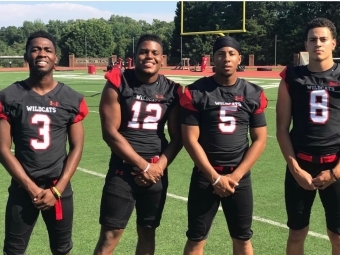 Members of the football team with Jonathan Sheperd-Smith ’18 (#12)