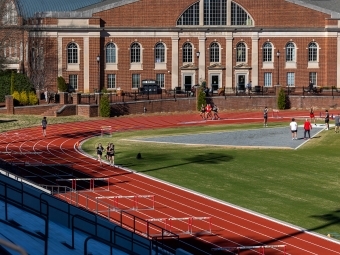 Lisa and Jeff Case Track & Field Complex view from the stands with student union in the background