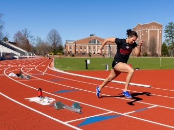 Lisa and Jeff Case Track & Field Complex runner on the track