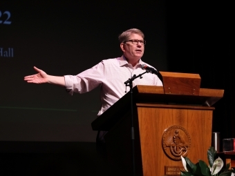 President Doug Hicks on the stage during employee appreciation